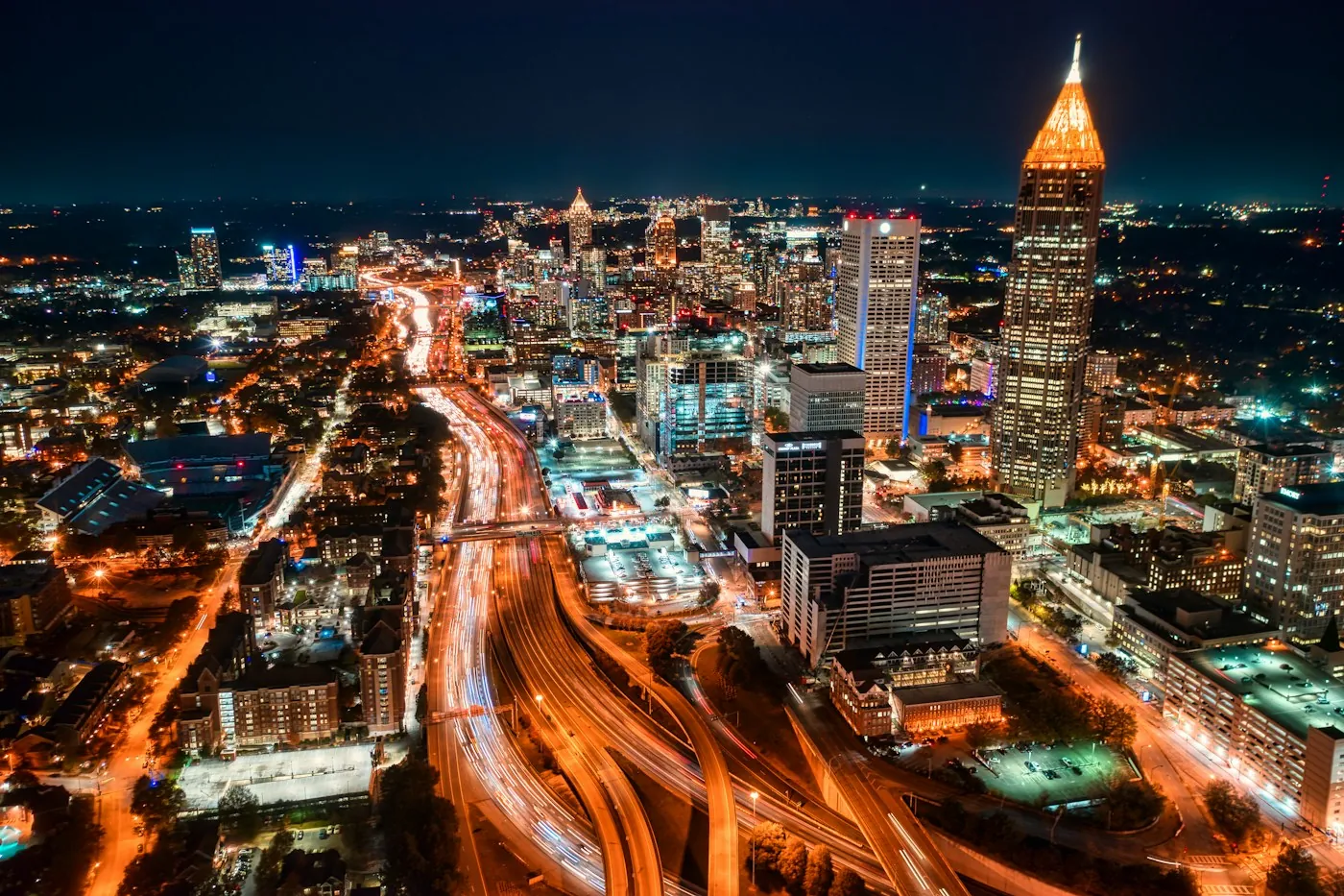 Downtown Atlanta at night with freeway light trails