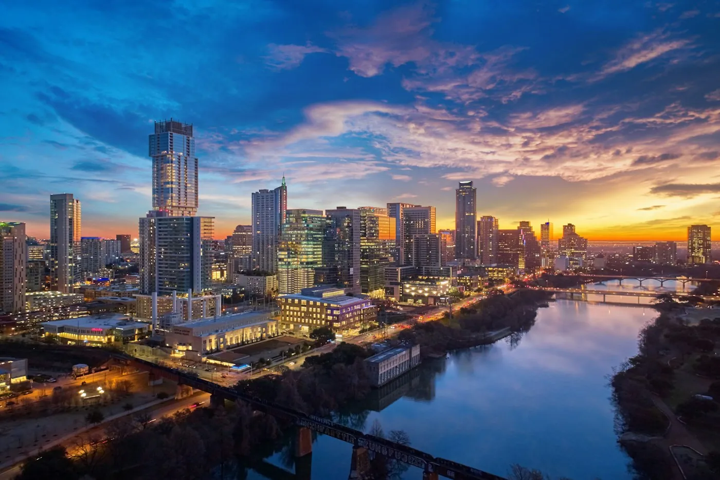 Austin skyline over Lady Bird Lake at sunset