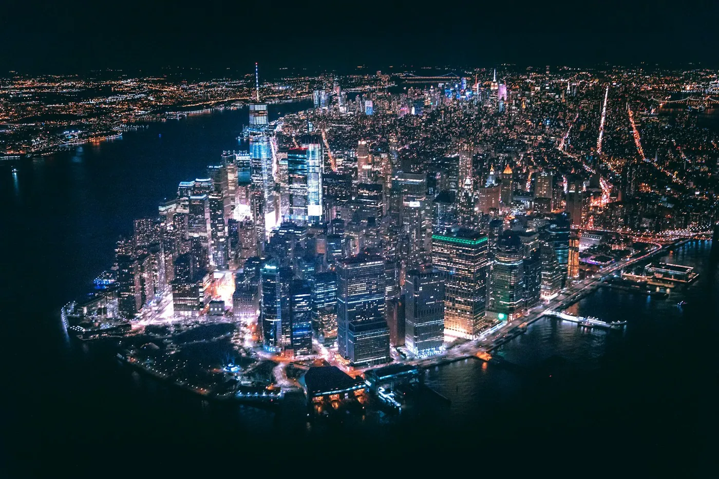 Aerial view of Manhattan glowing at night